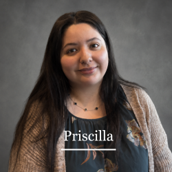 Headshot of receptionist Priscilla against a neutral gray background.